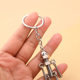 Factory wholesale robot retro handmade diy keychain pendant mobile robot movable screw man