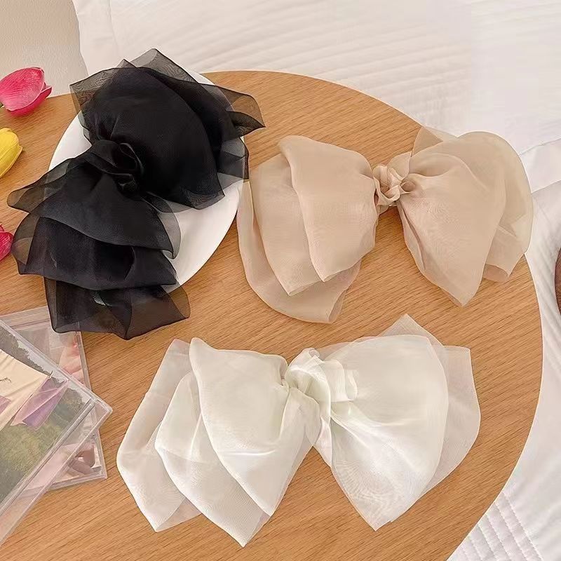 ネット紅のシフォンのスプリングは超仙の大きい蝶結びの髪を挟んで馬尾の女性の後頭部の新型の雲の頭の花の髪飾りを挟みます。|undefined