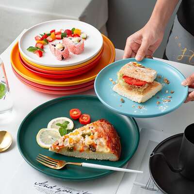 Source manufacturers wholesale Nordic household creative ceramic Western steak plate Net red round pizza plate foreign trade cross-border