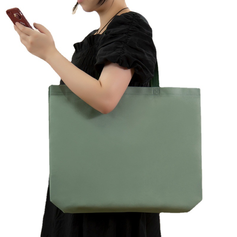 Clothing store handbag printed logo women's clothing children's clothing shopping bag clothing training institutions non-woven bags in stock