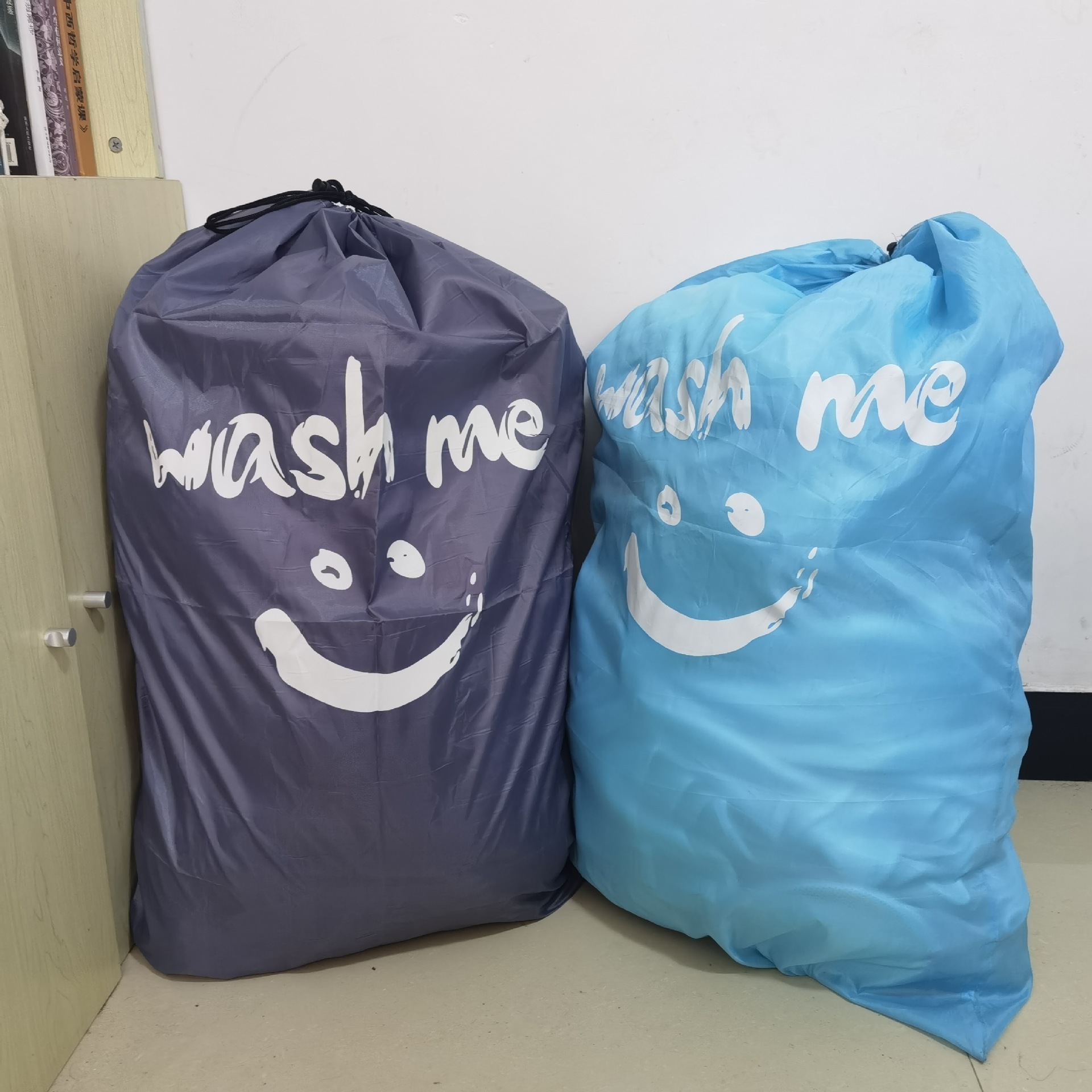 Spot sales cross-border smiling face printed laundry bag dirty clothes bag drawstring storage bag 70*100cm a generation of hair