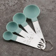 Blue measuring spoon
