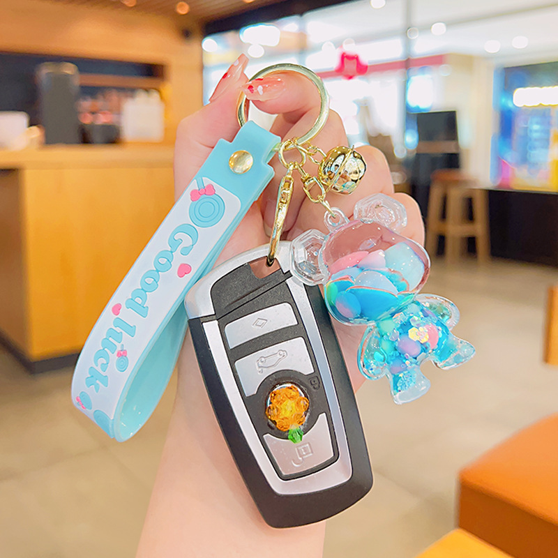 Cartoon violent bear quicksand bottle key chain stall small gifts wholesale acrylic floating into the oil liquid key chain