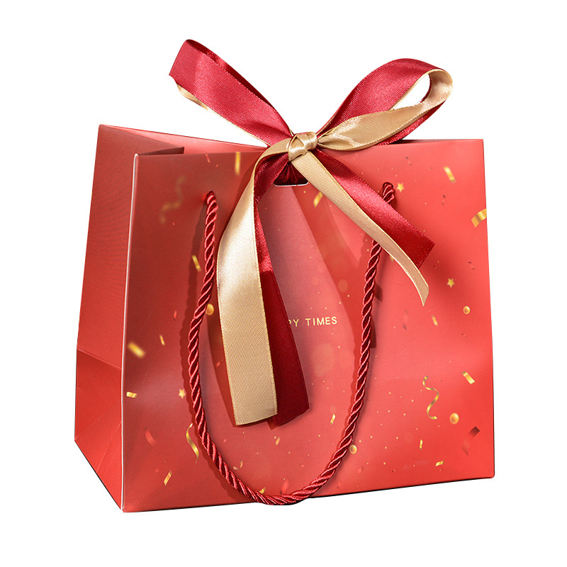 Red festive red gift bag candy packaging bag gift bag New Year gift bag universal paper bag handbag ribbon