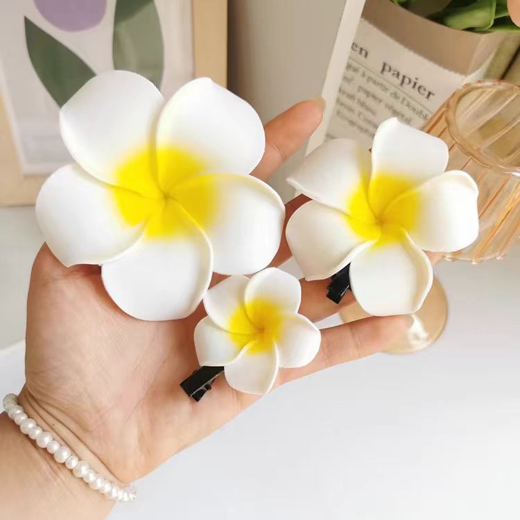 Dai people dress up seaside holiday egg flower hairpin travel photography headdress flower side clip small size fairy hairpin_voghion.com