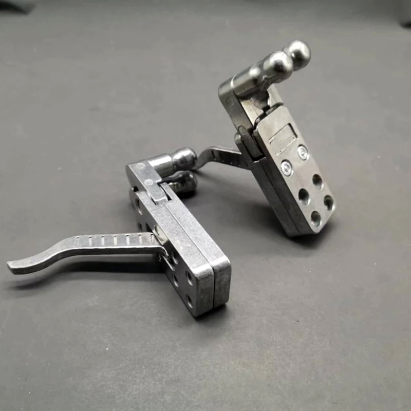 Wholesale stainless steel spreader two-axis linkage automatic reset alloy quick opening and closing rebound metal clip bomb