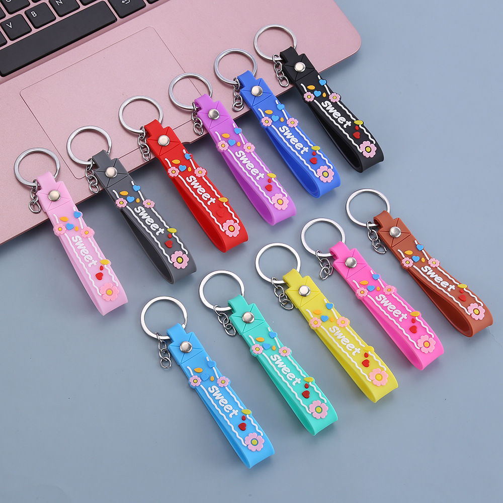 Trendy fashion key chain leather rope wholesale creative letter small flower PVC key chain pendant bag gift lanyard