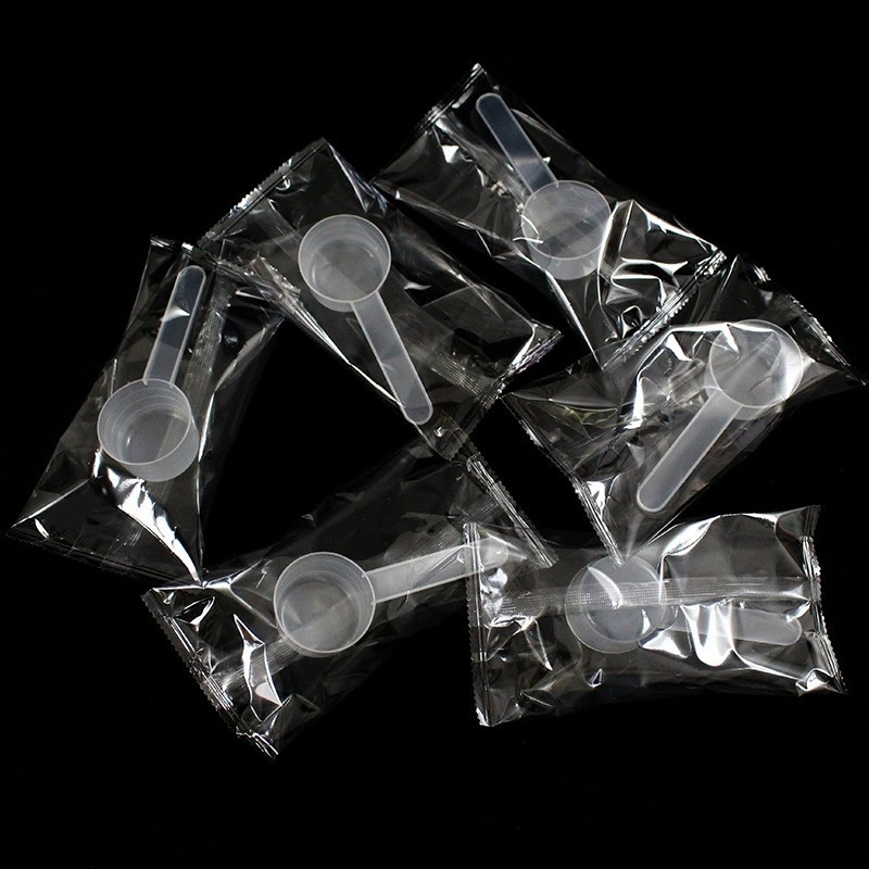 Plastic measuring spoon wholesale 20g spoon independent packaging 40ml transparent quantitative powder liquid with scale