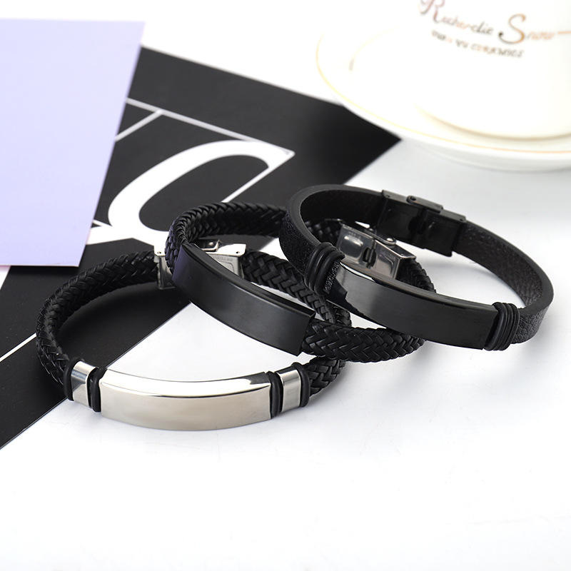 European and American electricity supplier retro leather rope woven couple bracelet stainless steel bending brand laser lettering titanium steel jewelry