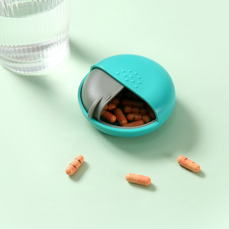Factory supply round one-compartment medicine box push-pull plastic storage box medicine box portable sub-packing box wholesale