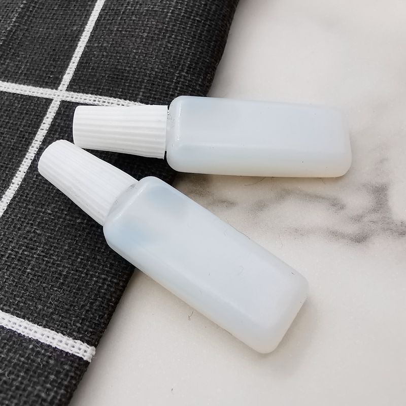 Day throw type double eyelid sticker glue 2M false eyelash glue plastic flat tube milk white glue transparent glue