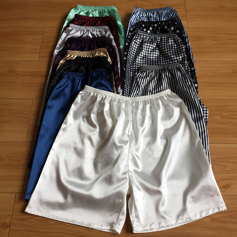 卸売りの大きいパンツの男性の半ズボンの寝ているズボンの夏の溥項のシミュレーションのシルクのビーチのズボンの氷の糸の家のズボンの5分は外に着ることができます。|undefined