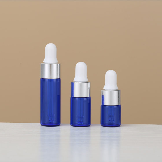 Explosions Brown essential oil bottle 5ml blue rubber head dropper bottle essence emulsion bottled cosmetics packaging wholesale