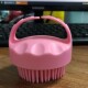 Pink bath brush with long teeth