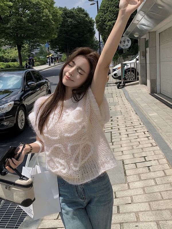 Spring and Autumn lazy style loose sweater coat New hollow letter hand hook sleeveless sweater shawl top women's clothing