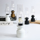 Kerosene lamp with white base