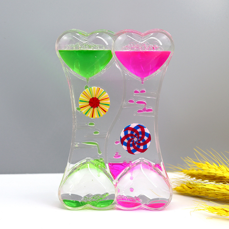 Two-color oil spill toy dynamic decompression oil drop hourglass Crafts desk ornaments student gifts graduate children