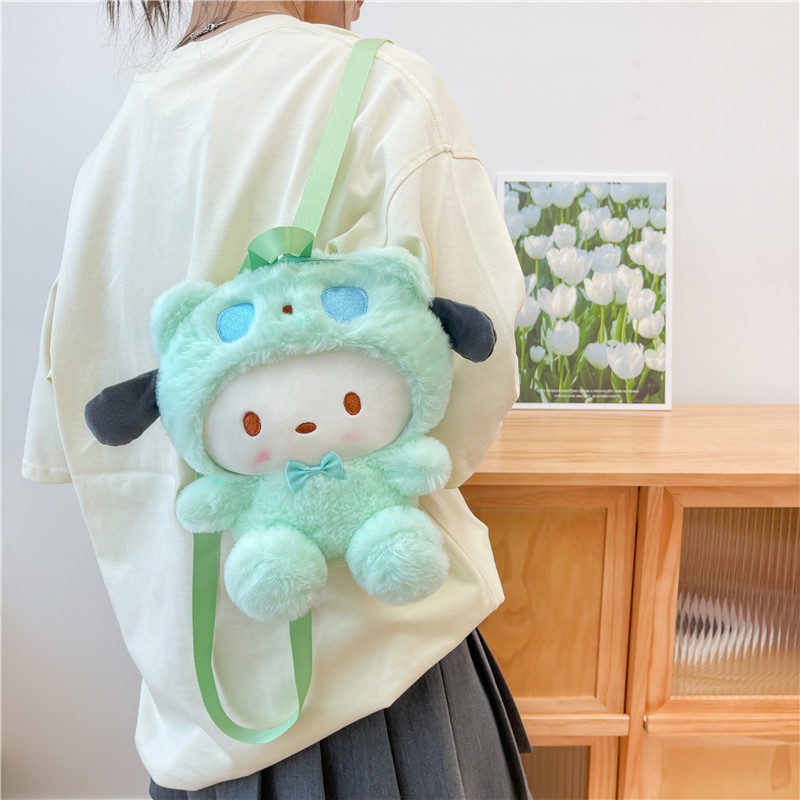かわいいアニメのサンリオのぬいぐるみの公の子の包みの日本の倉庫の洛米は機械の人形のリュックサックの収納の小さい包みをつかみます|undefined