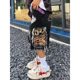 European and American street fashion hip hop men and women couple ins fashion brand ripped Embroidered Tassel High Street Denim shorts