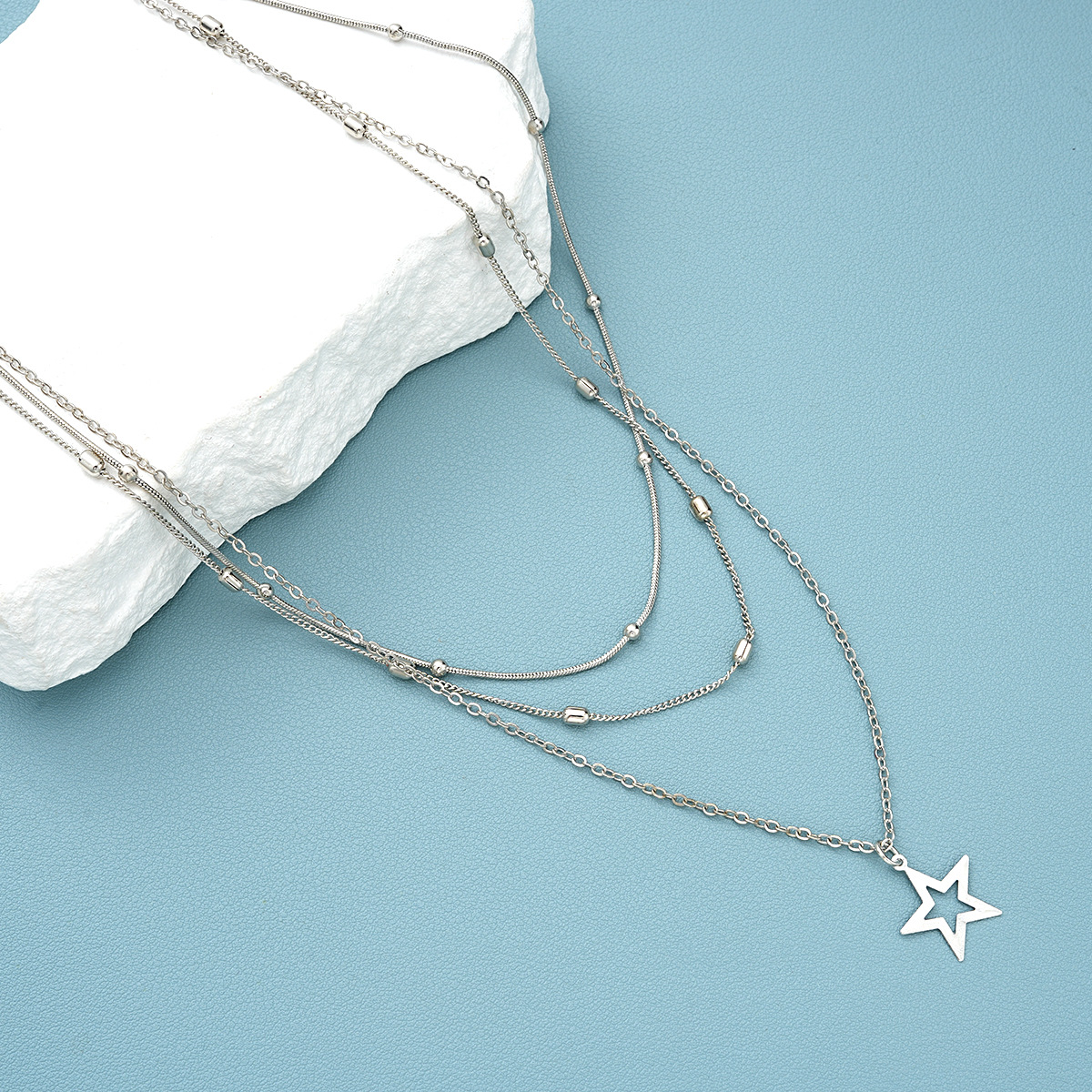 Neue hohle fünfzackige Stern Anhänger Halskette kreative Persönlichkeit Retro Legierung Perle Kette Schlüsselbein Kette Frauen_voghion.com