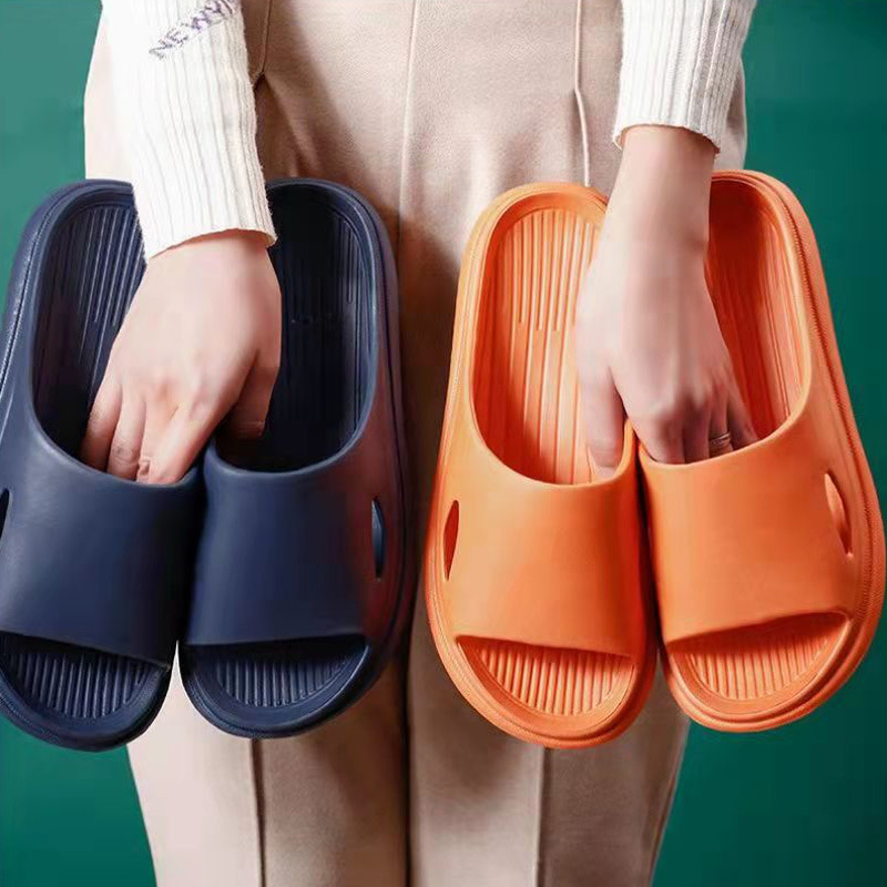 Wholesale New couple home non-slip hollow EVA slippers women's simple thick bottom dormitory sandals one-piece delivery