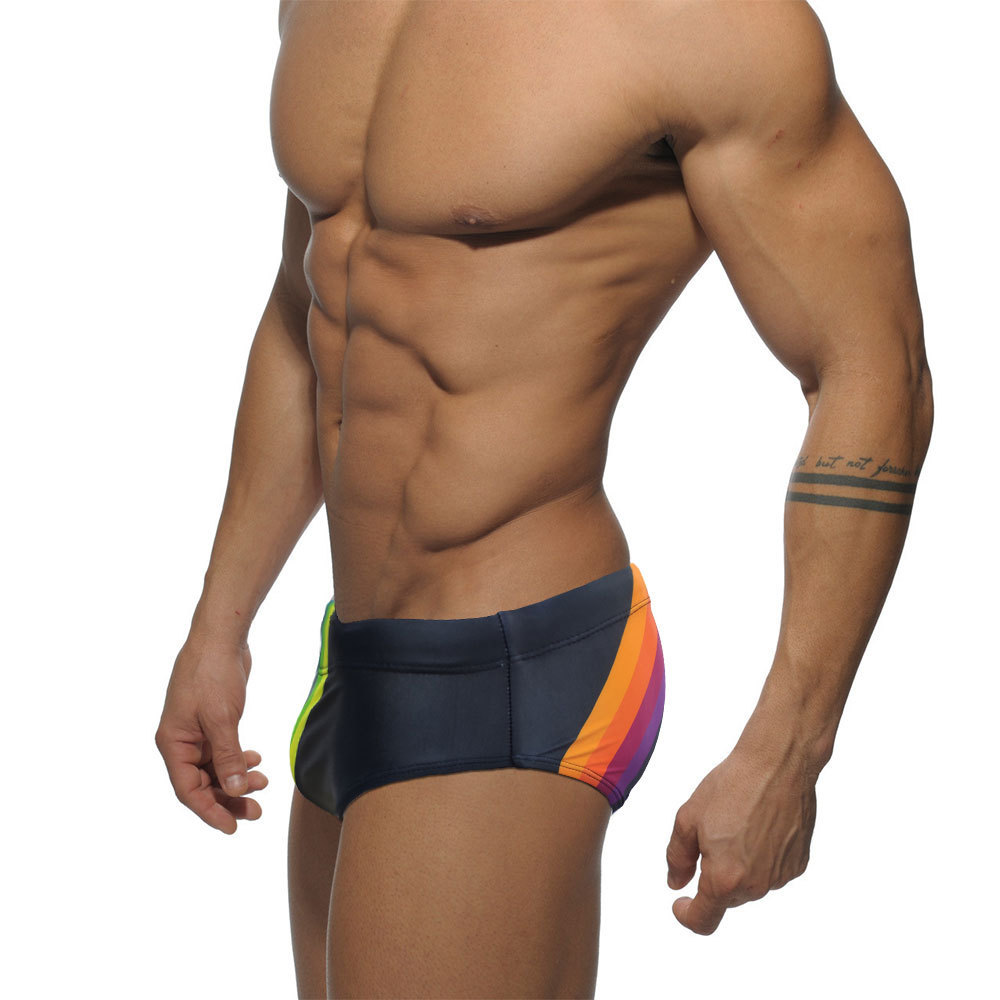 Spot AliExpress swimming trunks rainbow print low waist men's triangle swimming trunks Cup Anti-embarrassment tether beach pants