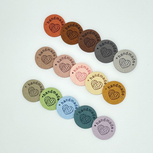 Color label handmade love round two holes embossed soft leather label hat handmade bag children's clothing clothing label