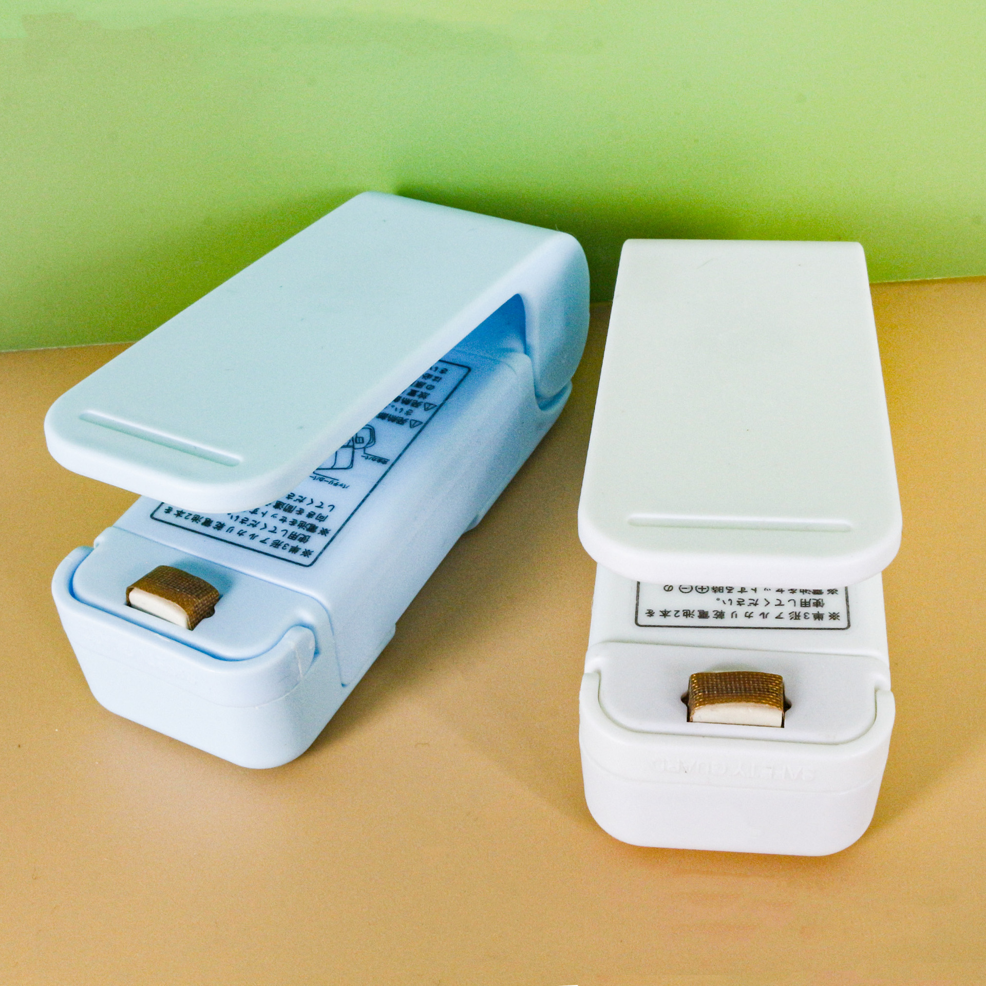 Hot sale portable mini sealing machine plastic sealing machine snack plastic bag sealing machine household hand pressure heat sealing machine artifact