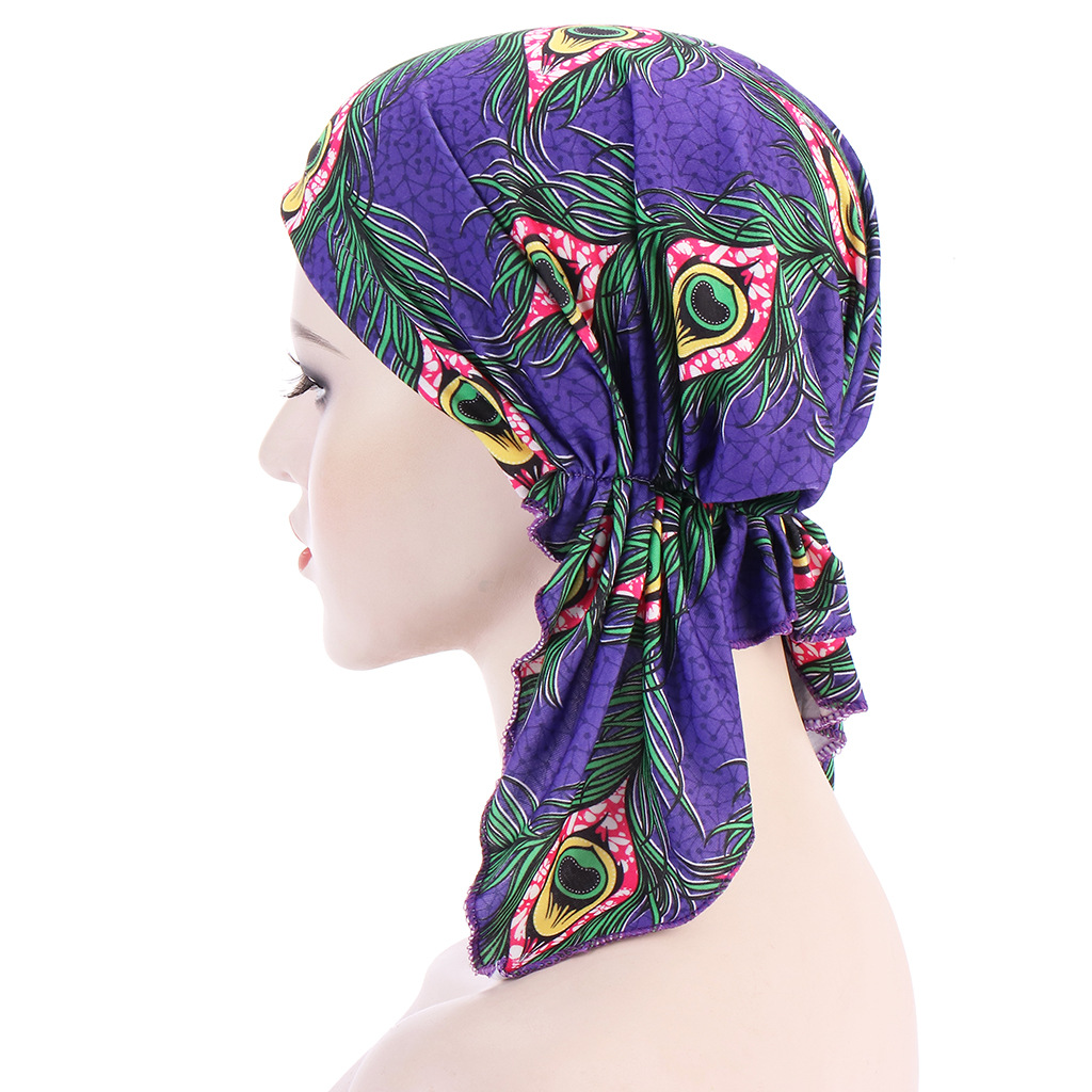 Europe and the United States new flower cloth curved cashew feather head cap two-horn cap elastic Muslim turban cap