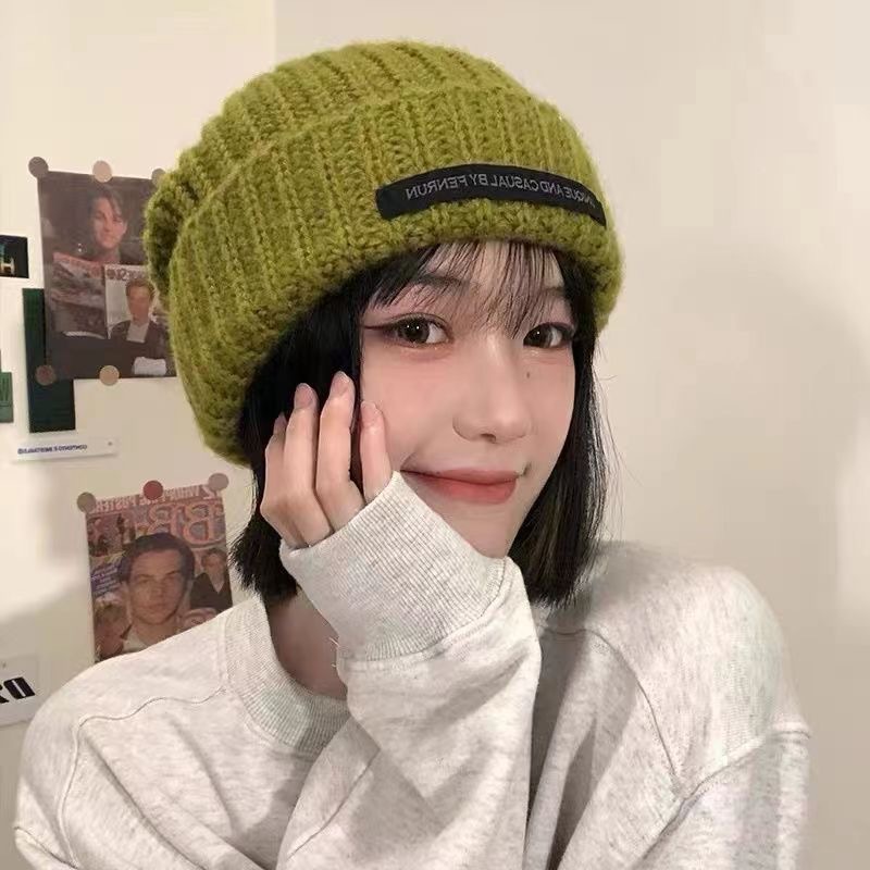 Winter Day South Korea warm hat female twist all-match outdoor pullover hat face-looking primary school student autumn and winter fashion knitted hat