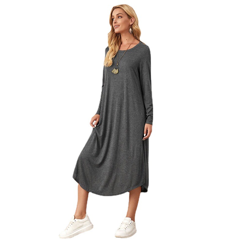 2022 autumn and winter New European and American women's solid color knitted side seam straight pocket curved hem loose dress