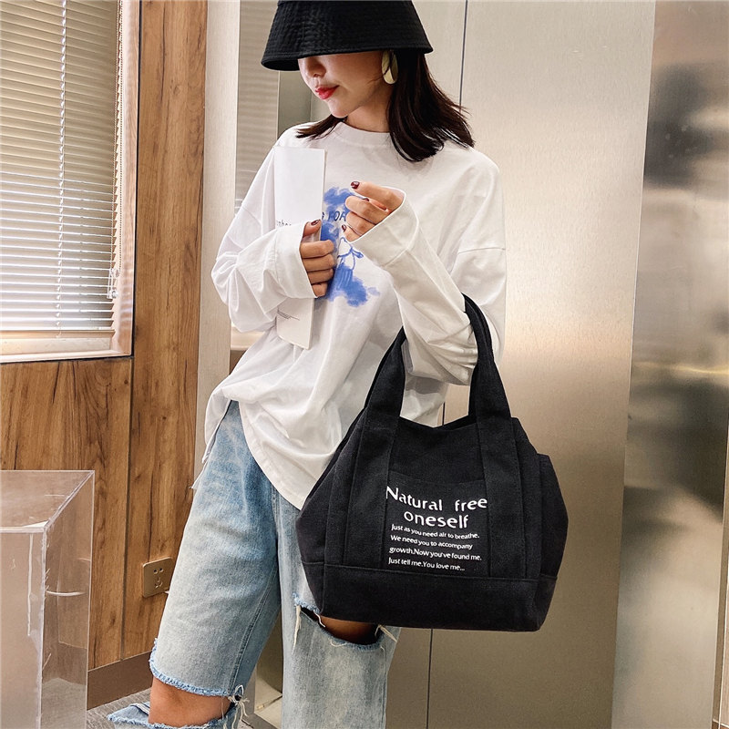 Cross-border Women's bag 2023 new casual fashion fresh letters portable big bag canvas artistic Mori shoulder bag