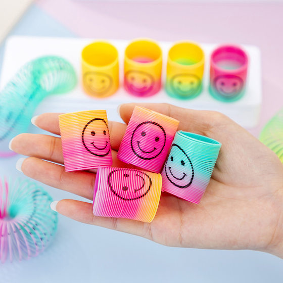 Mini smiling face rainbow ring children's cartoon spring ring folding ring magic kindergarten activities small gifts 2 yuan play