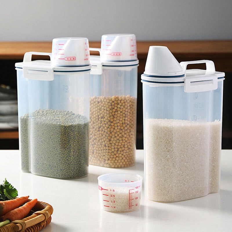 日本式の透明な雑穀の桶のプラスチックの台所は缶の米の桶の粗食の缶を密封して五穀の雑穀の収納箱を密封して卸売りします。|undefined