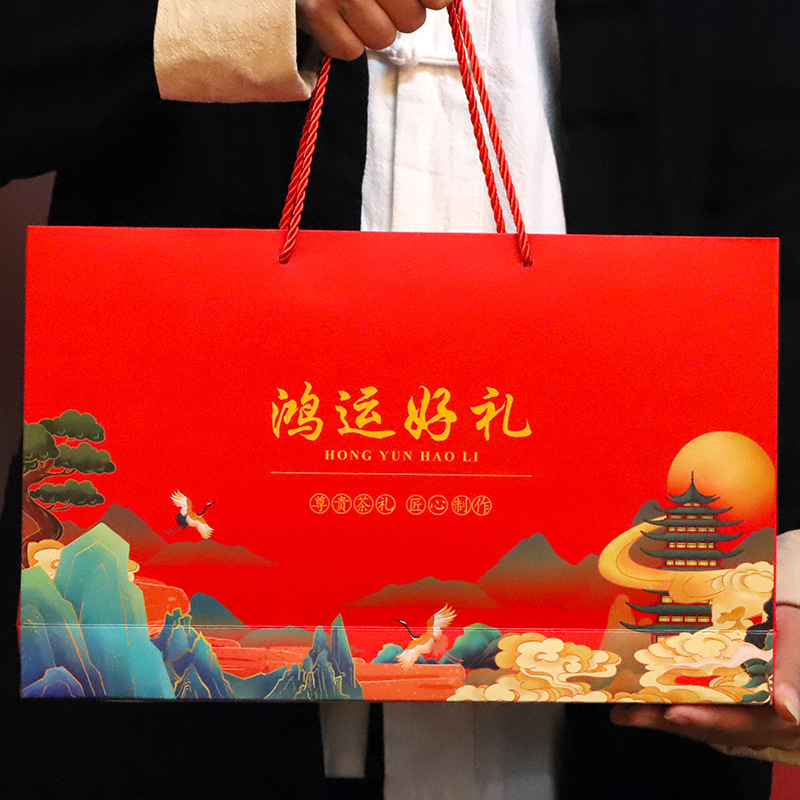 Three big tea Golden Junmei iron guanyin Red Robe Tea 9 small cans free tea set new year gift box
