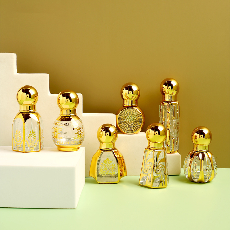 Middle East Glass Essential Oil Bead Bottle Metal Transparent Perfume Bottling Bronzing Plating Process Factory Wholesale