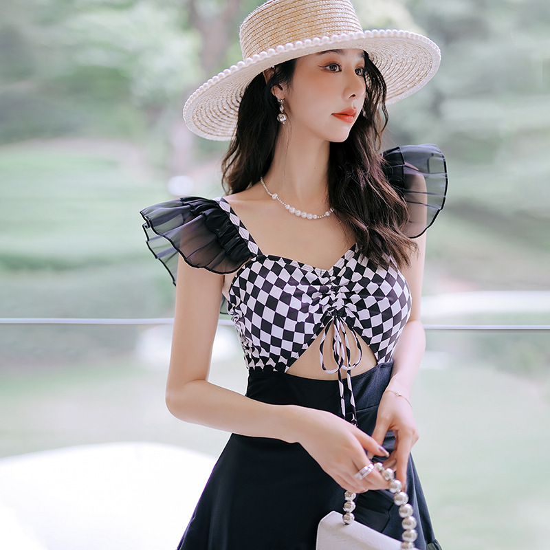 泳衣女2023新款純欲學生保守遮肚顯瘦性感小胸短袖連體溫泉泳裝