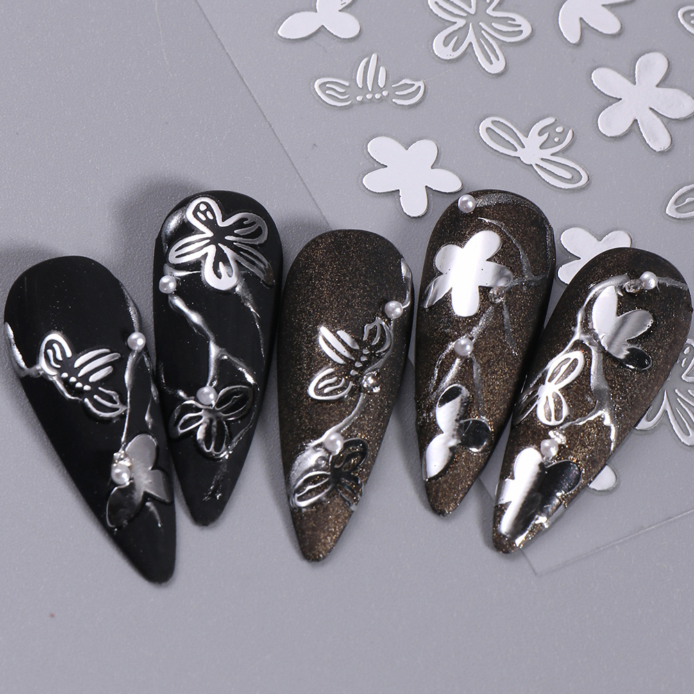 New nail stickers wholesale gilding three-color leaves painted hollow flower black and white star nail adhesive stickers