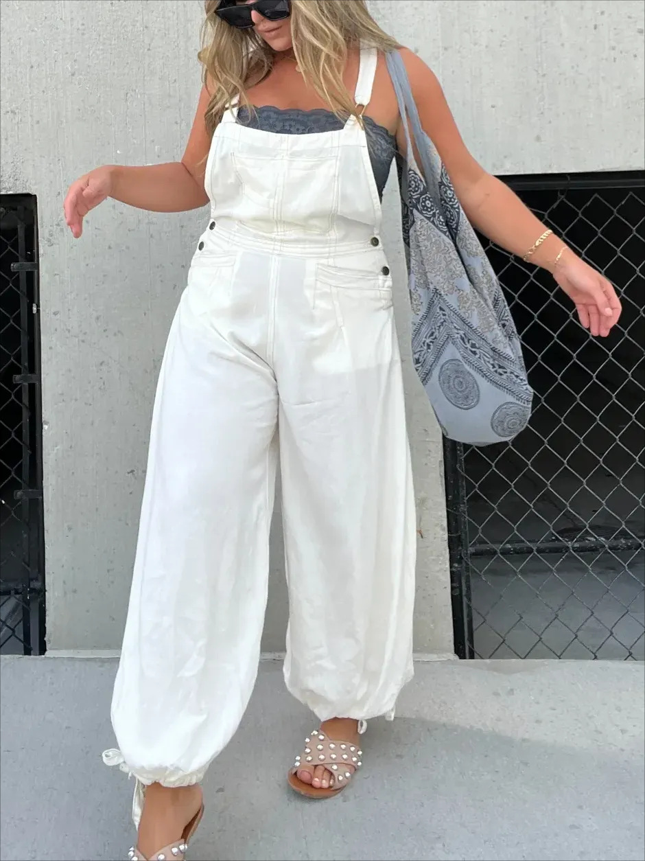 2023 European and American cross-border foreign trade Women's suspender jumpsuit solid color stitching suspender ankle-tied trousers