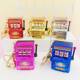 Creative playable mini fruit machine shaker shaker turnaround game keychain pendant simulation bag