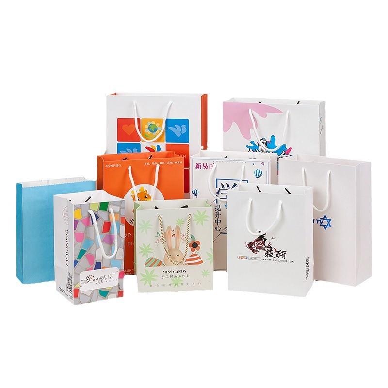 White card film coated paper bag clothing packaging handbag in stock gift bag printing gift shopping bag logo hand carry
