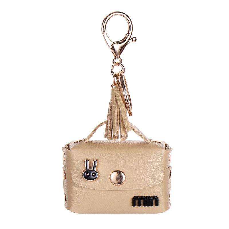 Live streaming Internet celebrity imitation leather headset storage bag three generations Bluetooth headset cover Apple wireless Bluetooth headset keychain hanging