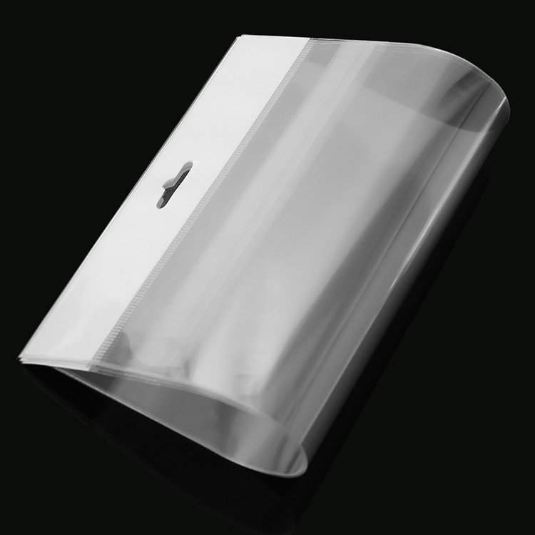 Wholesale White Pearl film hanging hole packaging plastic transparent clothes jewelry mobile phone self-adhesive bag opp card head bag