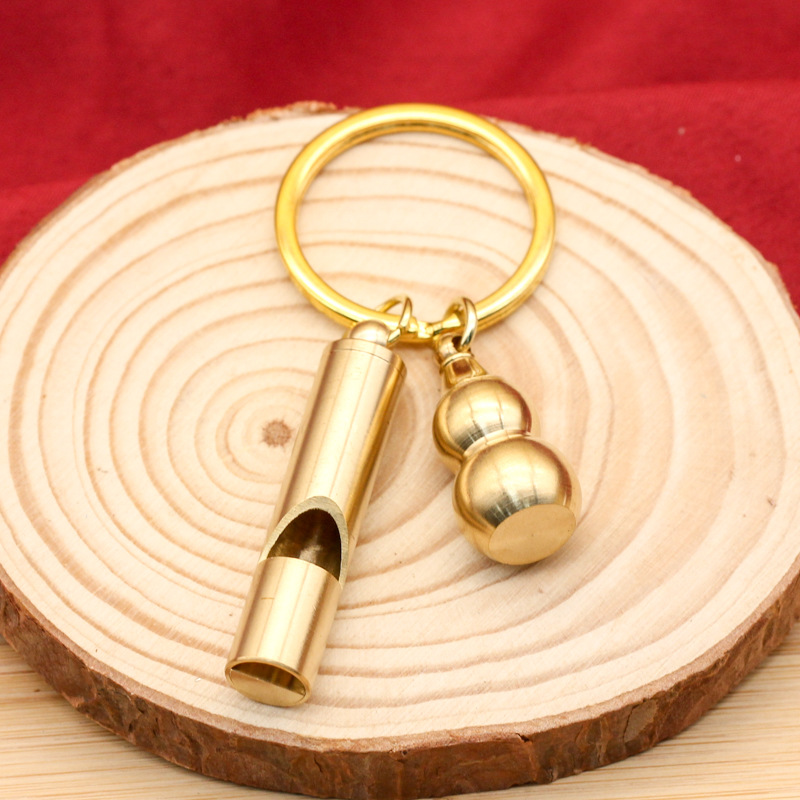 Brass whistle hollow small gourd keychain outdoor survival carry-on luggage pendant factory wholesale a generation of hair