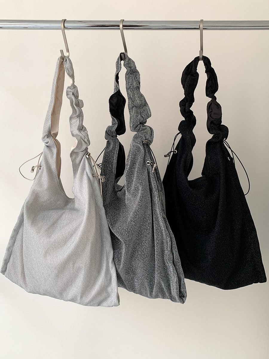 South Korea wide shoulder strap messenger bag girls' high-grade niche underarm bag drawstring pleated all-match large capacity shoulder bag