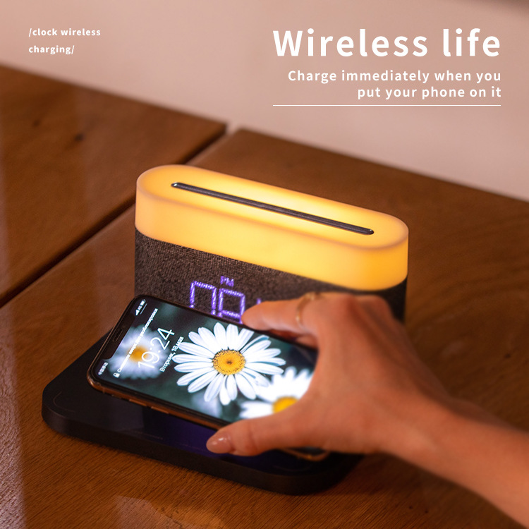 Shenzhen factory multifunctional three-in-one magnetic wireless charging LED time screen alarm clock 15W fast charging touch non-polar adjustment