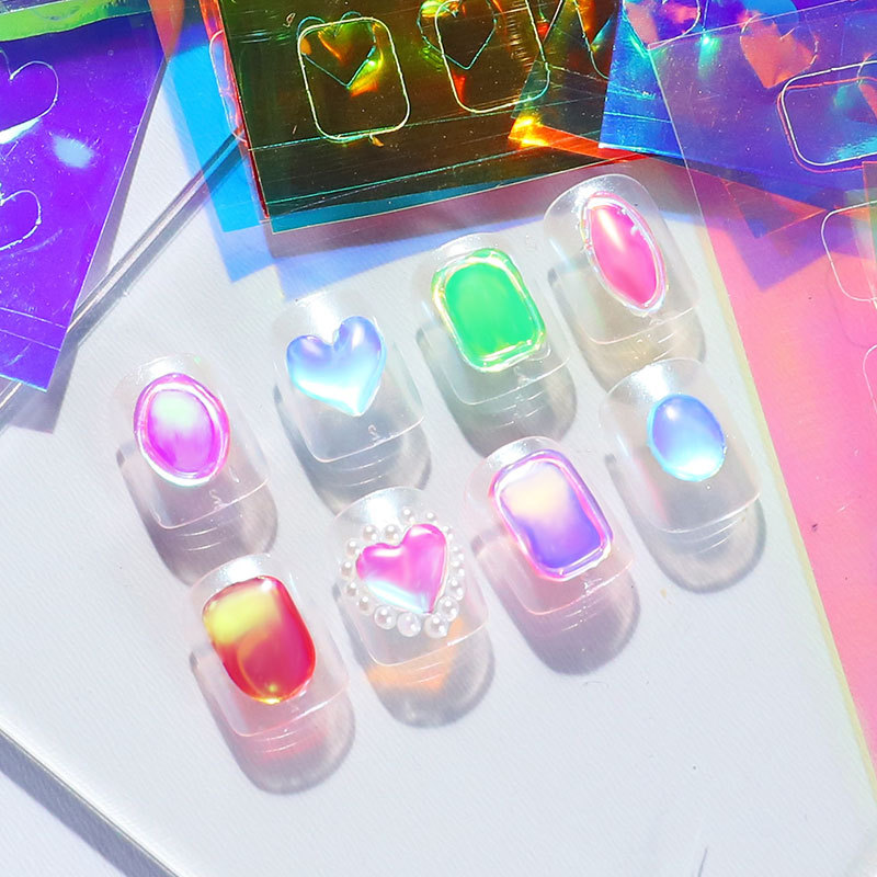 Cross-border new nail art aurora ice cellophane large laser paste magic paste transparent glue-free stickers wholesale