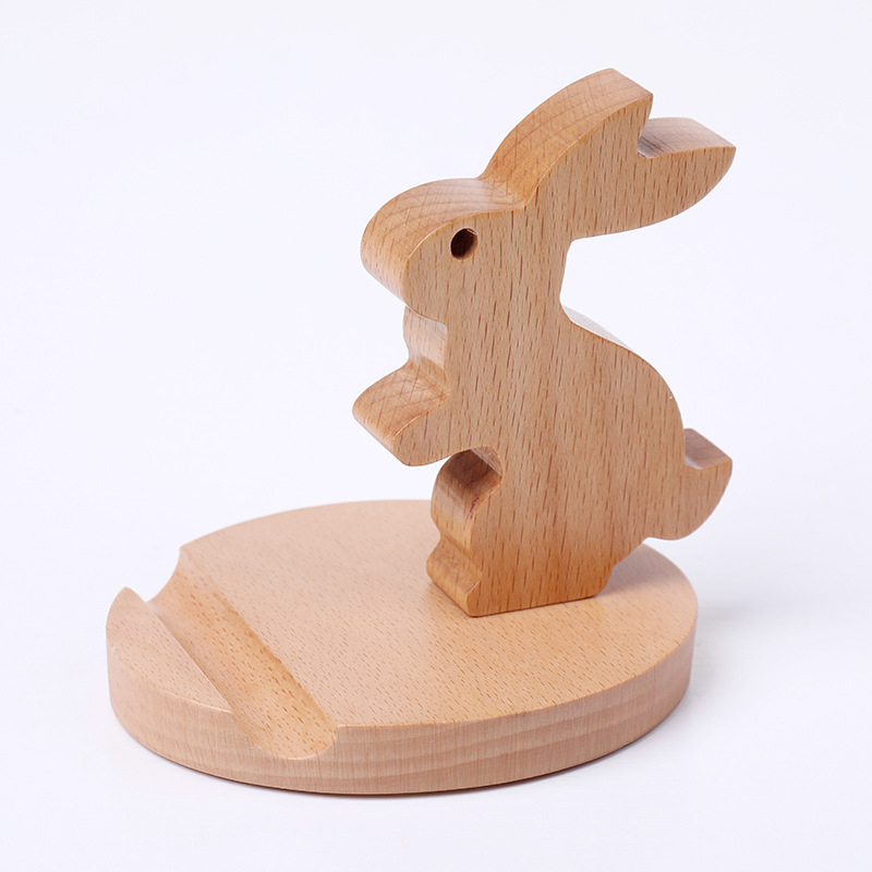Solid wood flat support to chase TV cute creative mobile phone holder desktop mobile phone holder wholesale engraved logo