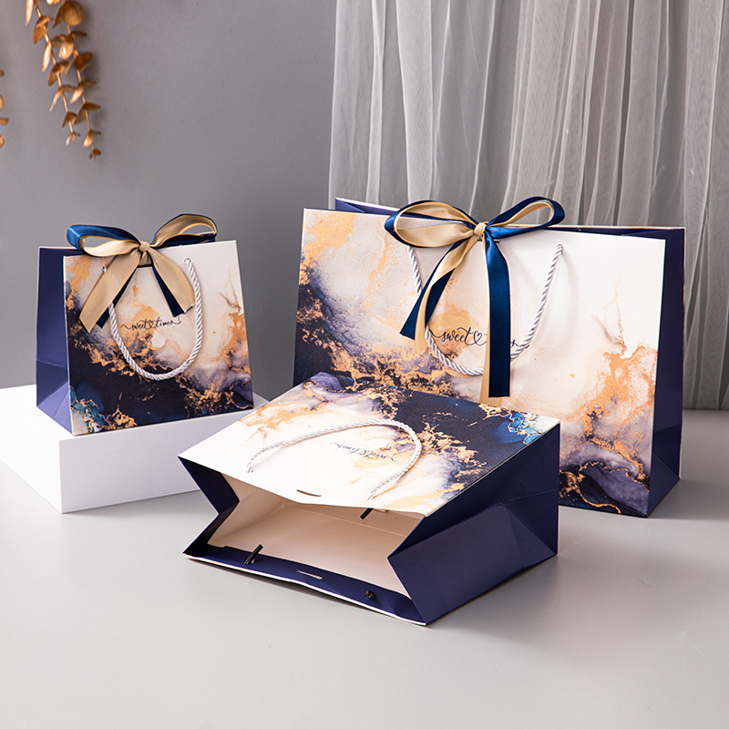 In stock sapphire blue marbling high-grade gift bag ribbon handbag cross-border color printing packaging bag foreign trade paper bag