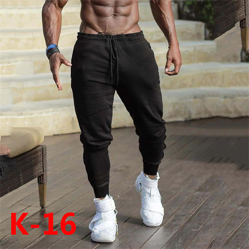 Primavera y otoño Pantalones deportivos de algodón slim fit hombres pantalones de fitness atados al tobillo muscle Boy Color sólido estiramiento pantalones de correr